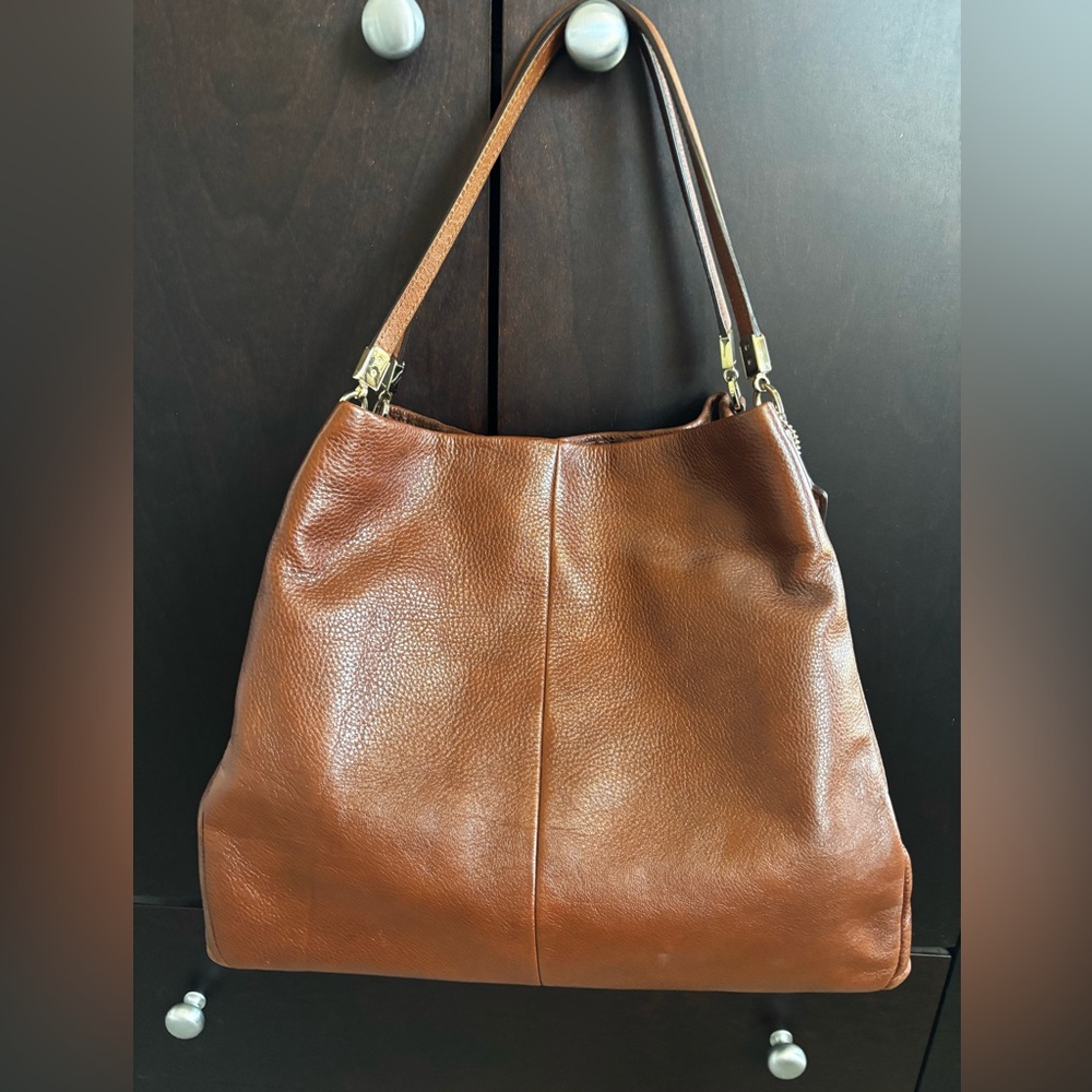Coach Chestnut Brown Leather Bag with rusty satin Interior. Gold accents.